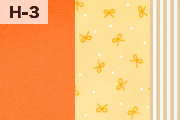 カルトナージュの家庭科教材の色見本：オレンジ・リボン柄・ストライプの3色ミックス（H-3）