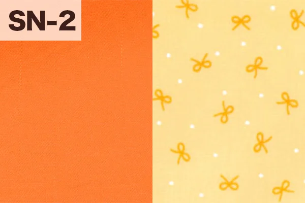 カルトナージュの家庭科教材の色見本:オレンジとリボン柄のミックス(SN-2)