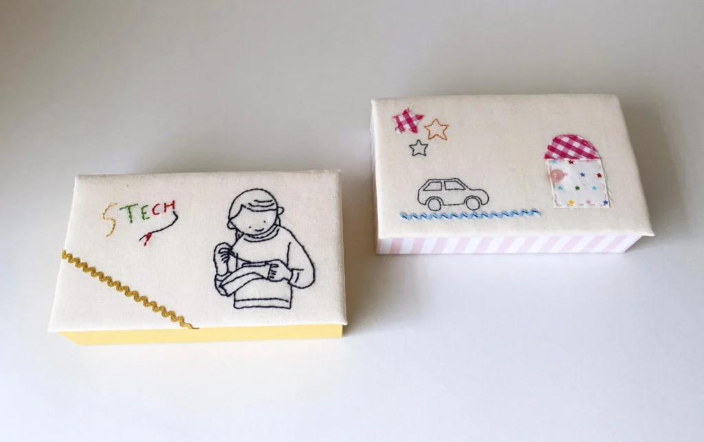 家庭科教材：刺繍＋カルトナージュの教材キット写真：お道具箱の２作品（刺繍）